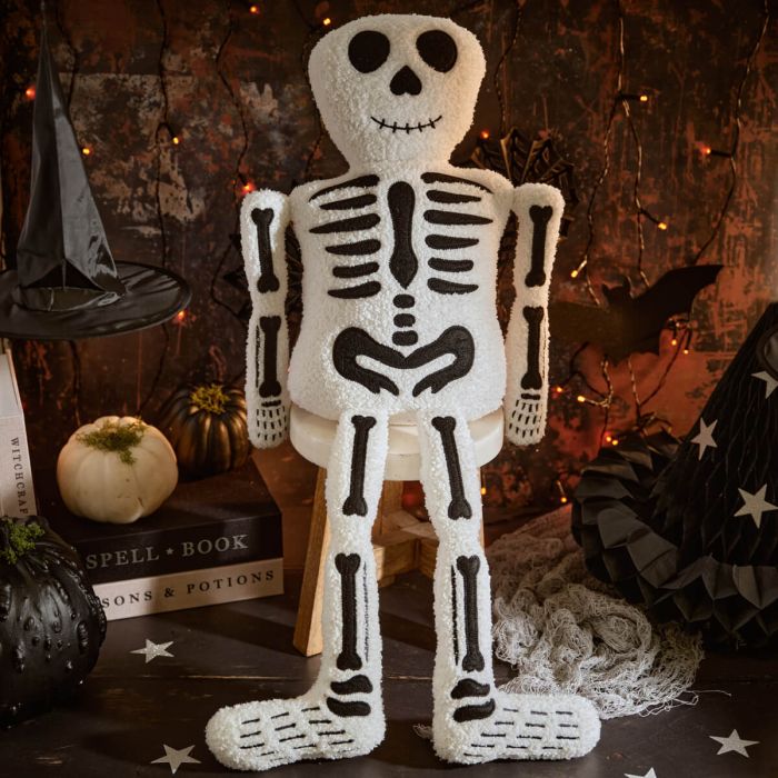 Creepy Cuties Dangle Leg Sitting Skeleton